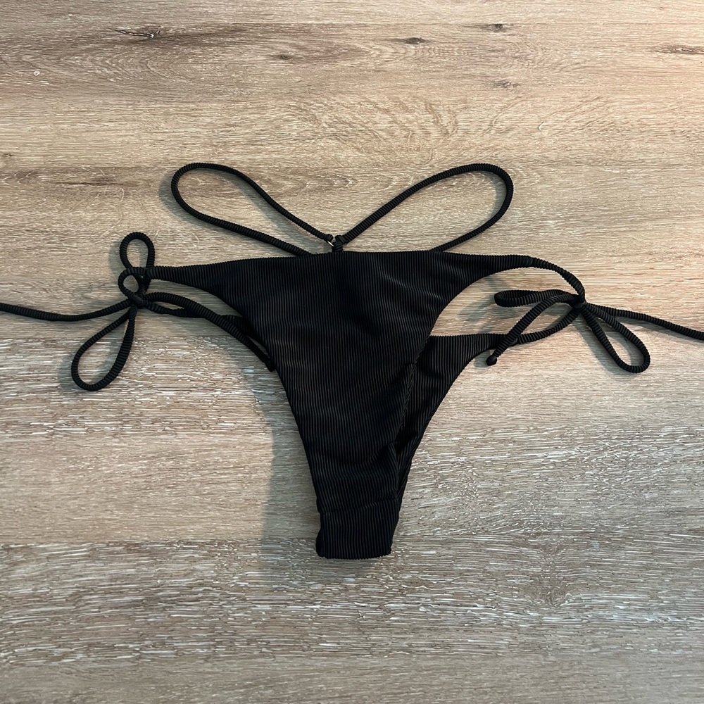 Brand new black ribbed one piece kailani bottom.